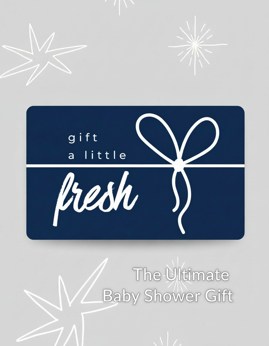 Blue gift card with 'gift a little fresh' text on a gray background with star patterns