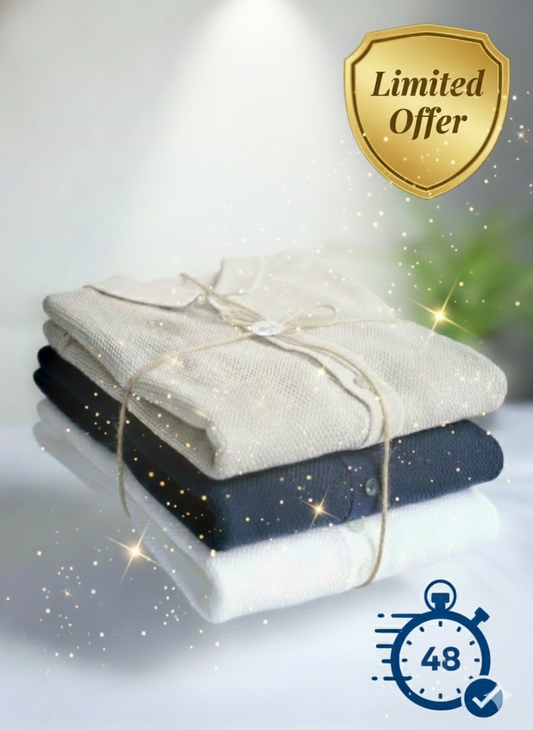 Stack of folded clothes tied with twine on a white surface with a blurred background